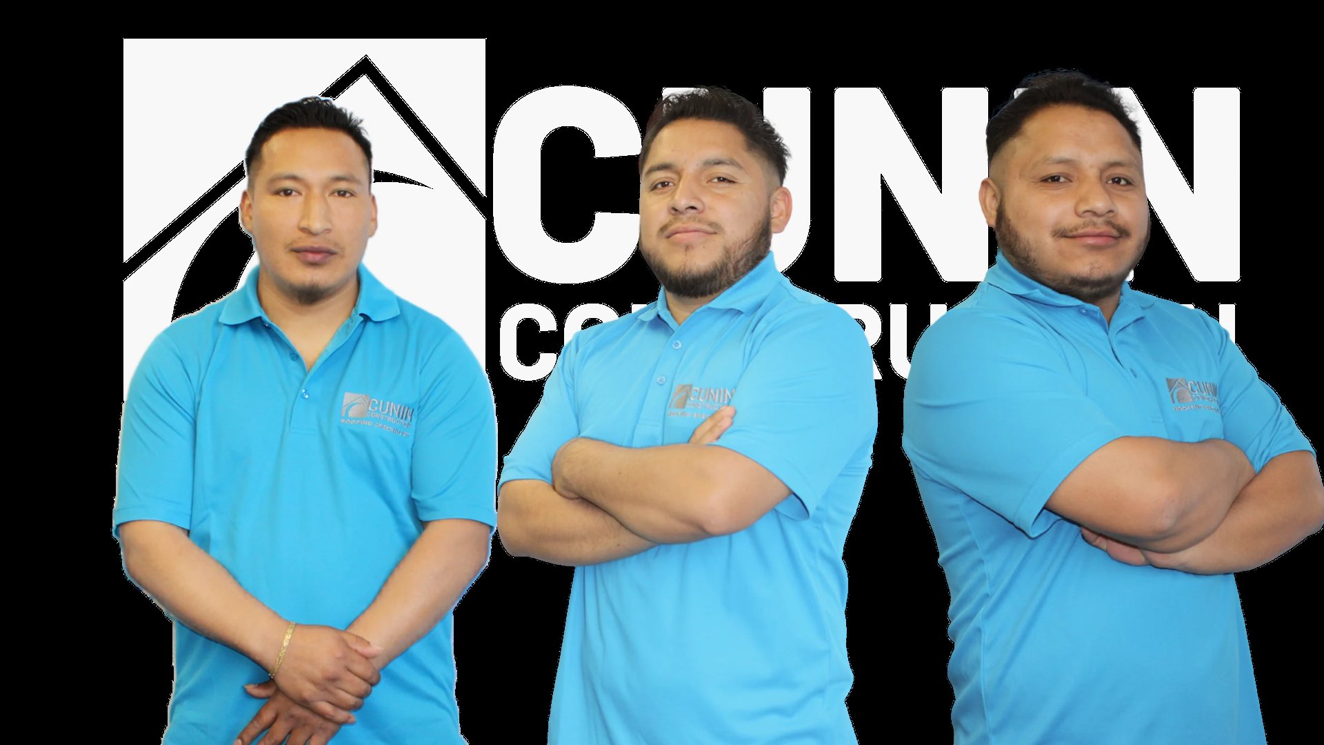 Three men in blue polo shirts posing together with arms crossed and by their sides against a dark background with partial text visible